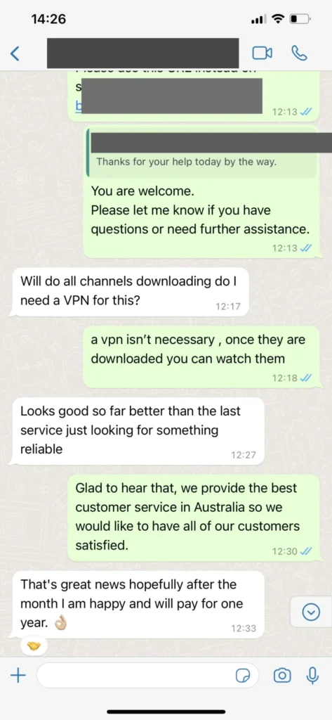 WhatsApp message confirming successful 12 month subscription renewal